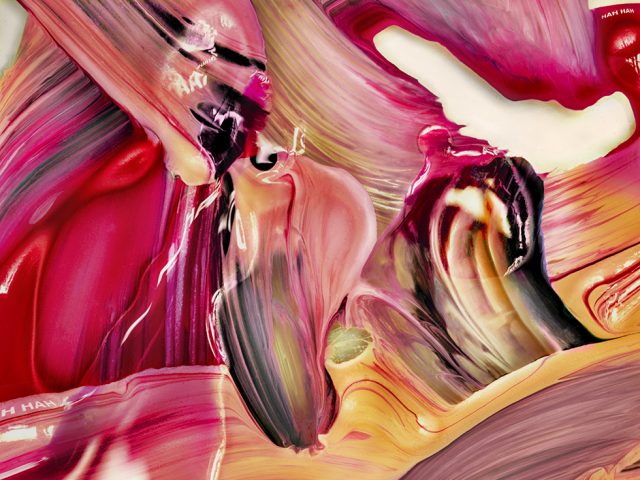 This is a color abstract close-up image of pink and orange brushstrokes of paint.