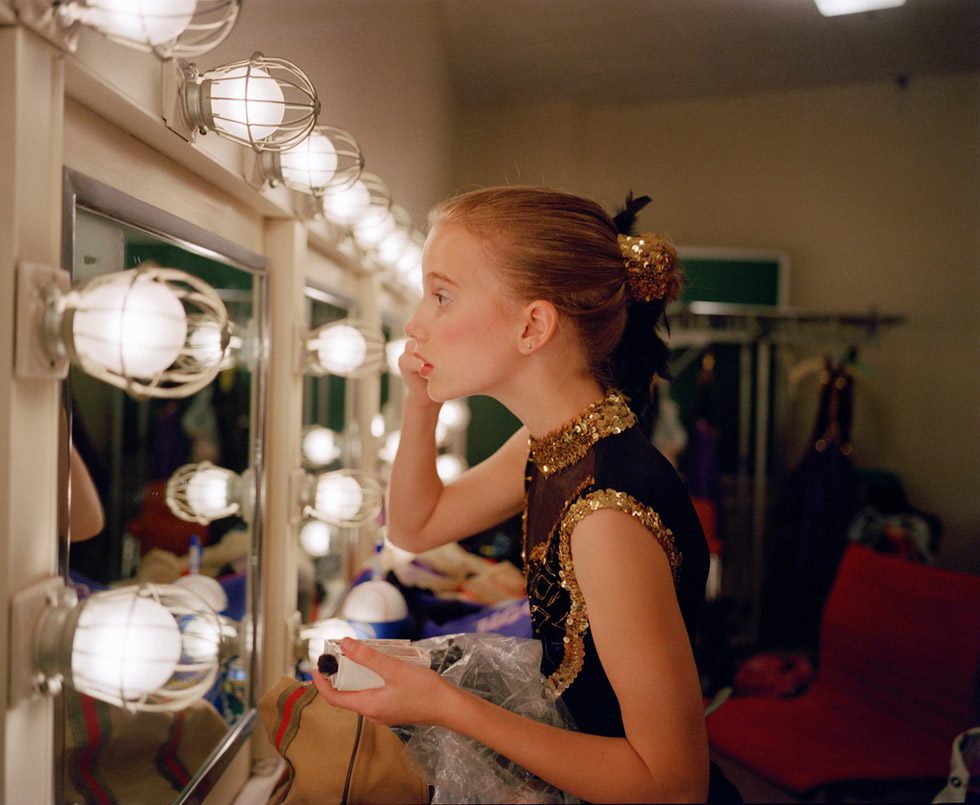 Katie Putting on Make-Up by Blake Fitch