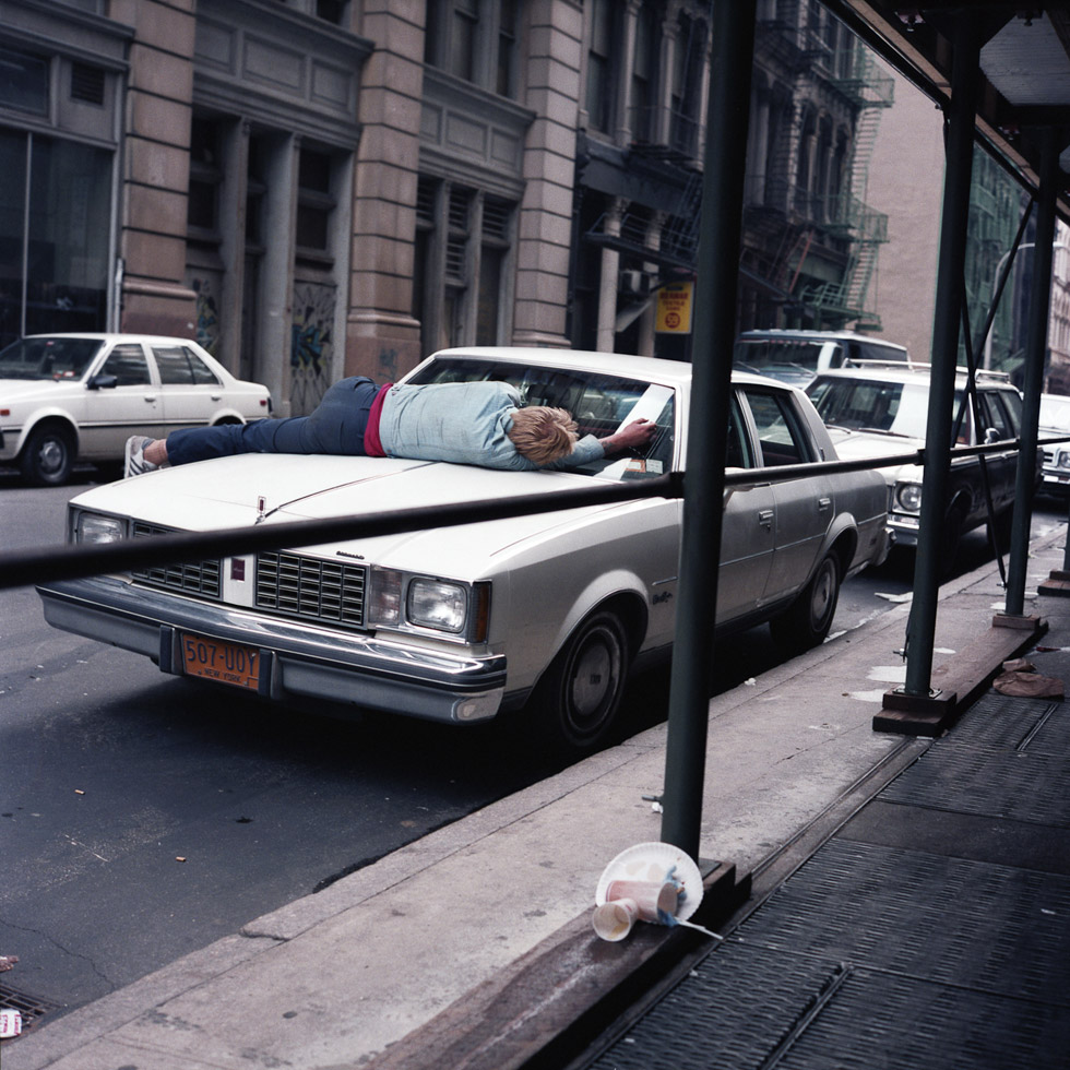 Man on Car by Janet Delaney