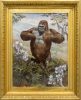 A painting of a gorilla in a gilded frame.