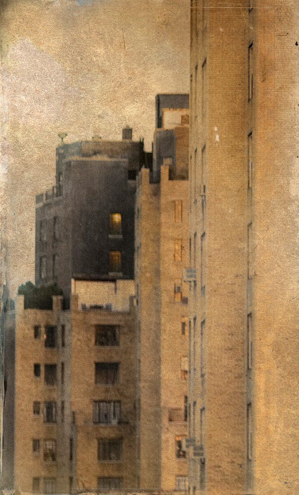 A hazy photograph of apartment buildings in New York City