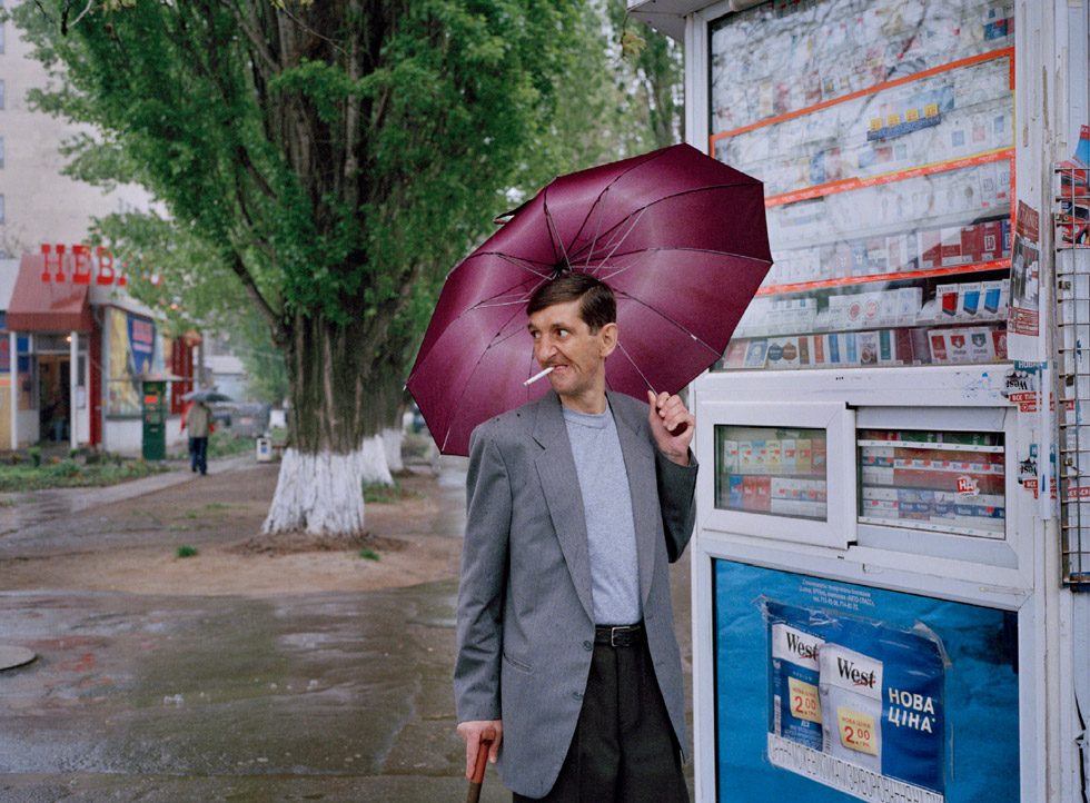 Untitled (Serej with Umbrella) by Andrea Diefenbach