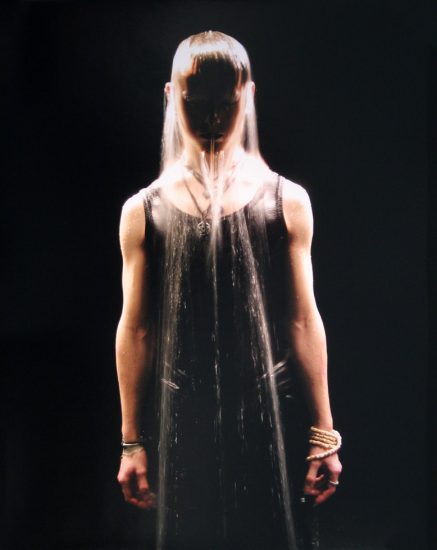 Click for sizes / editions / prices. An image of a male figure with water pouring over his head.