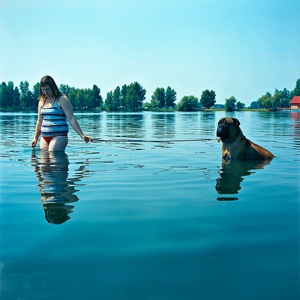 Untitled (Girl with Dog in Water) by Evžen Sobek