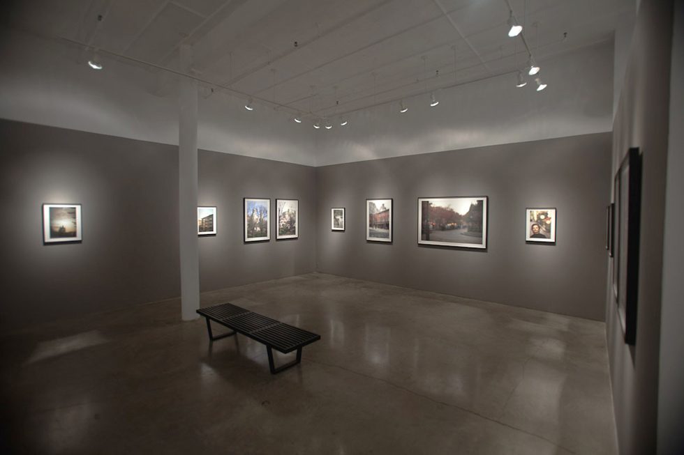 A photograph of Marc Yankus’ photographs on exhibit on display at Clamp