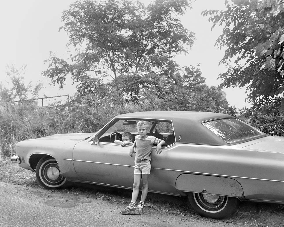 Two Boys with Automobile by Christine Osinski