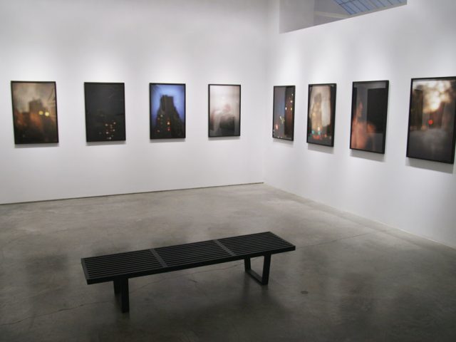 A photograph of Marc Yankus’ photographs on exhibit on display at Clamp