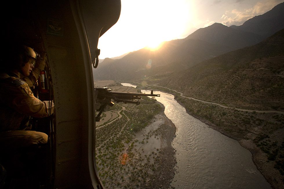 A view from the door of a  Blackhawk helicopter over the Kabul River headed to B by Chad Hunt