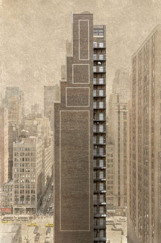 The side of a tall brick building in New York