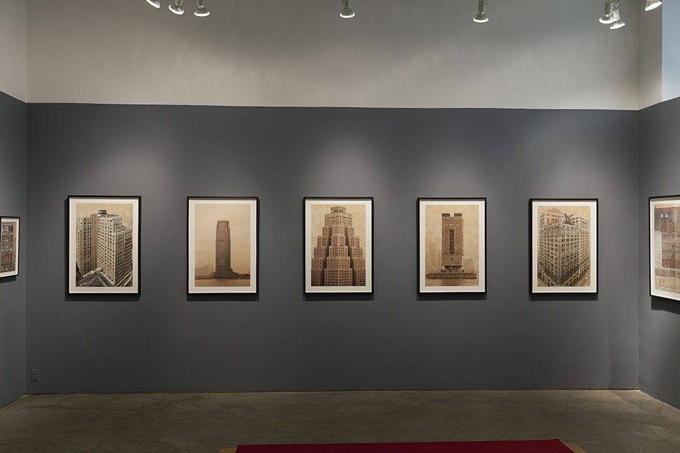 A photograph of Marc Yankus’ photographs on exhibit on display at Clamp