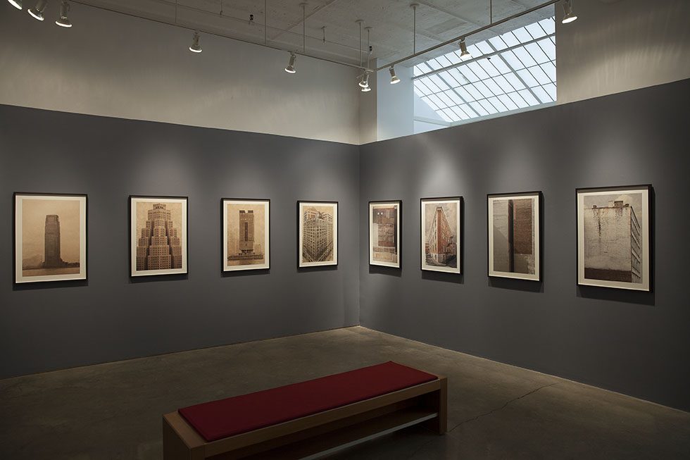 A photograph of Marc Yankus’ photographs on exhibit on display at Clamp