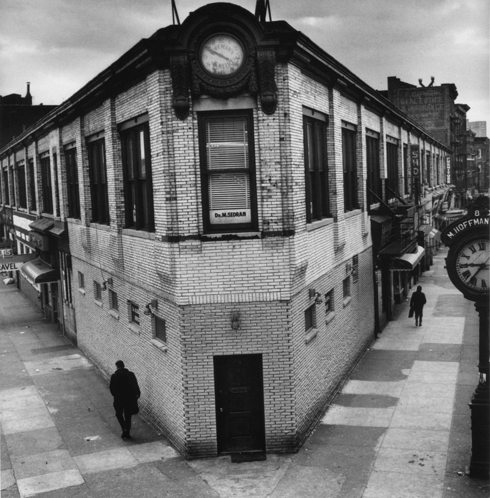 Two Streets, Two Clocks by Arthur Tress