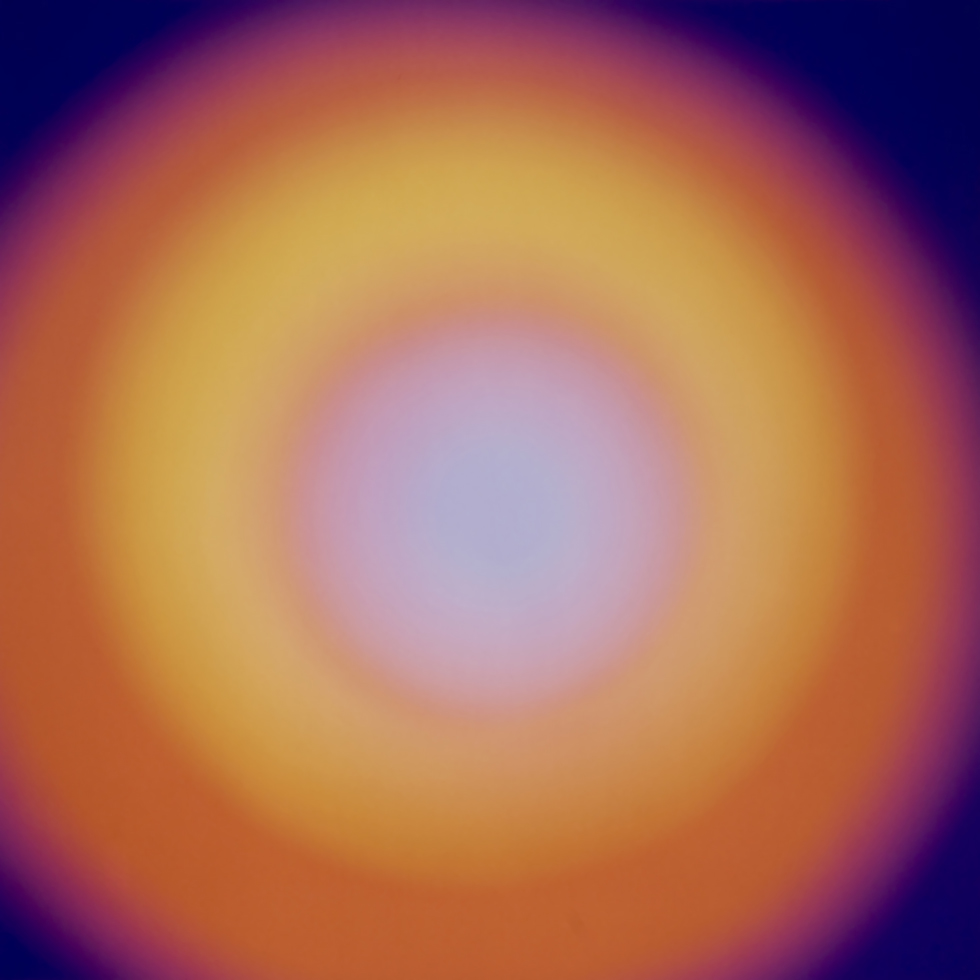 A blurred gradient of concentric circles transitioning from light blue at the center to yellow, orange, and deep purple at the edges, resembling a glowing aura.