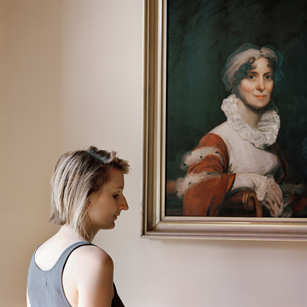 Edith, with a portrait of her ancestor by Frances F. Denny