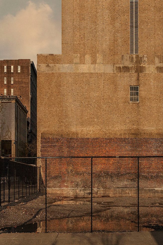 A photograph of the side of a brick building in New York City