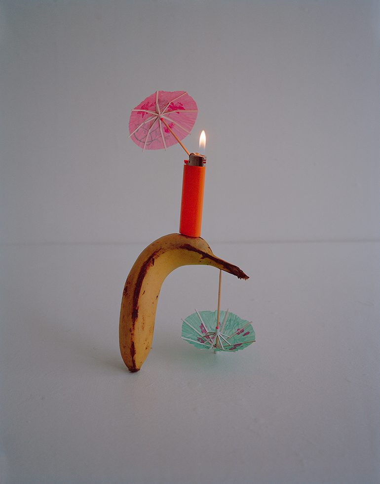 Bic Lighter, Banana and Cocktail Umbrellas by Adam Ekberg