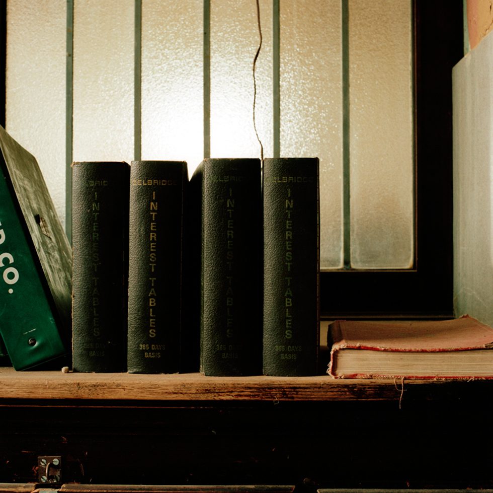 Wendy Burton, “Books, Abandoned Hotel” by Wendy Burton