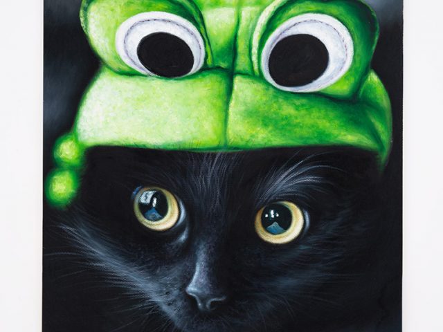 This is a painting of a black kitten wearing a frog costume.