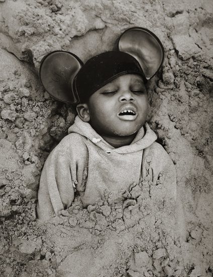 Arthur Tress, Boy in Mickey Mouse Hat, Coney Island, New York