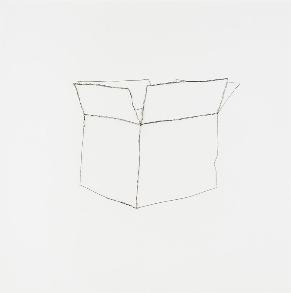 This is a black-and-white photograph of an open box made out of pieces of wire against a white background.