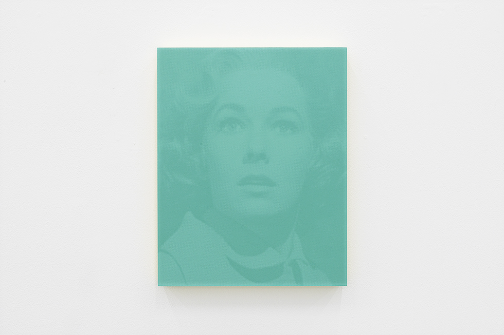 A photograph of Daniel Handal’s photographs on display in an exhibition at CLAMP in New York City.