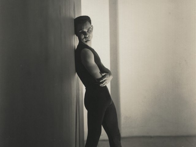 This is a black and white photograph taken by George Platt Lynes of Chuck Howard in a Body Suit.