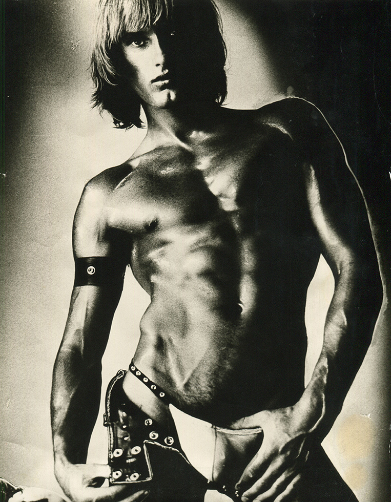 High contrast photograph of artist Peter Berlin shirtless