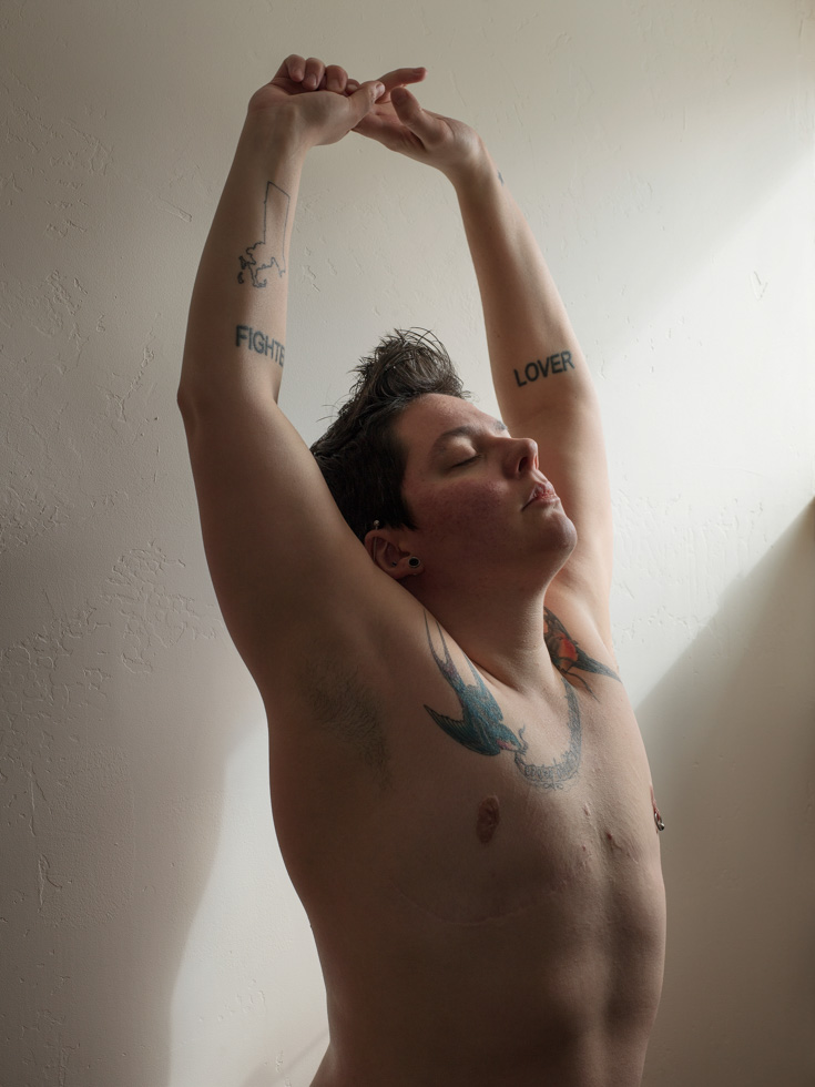 Jess T. Dugan, Self-portrait (reaching), 2014