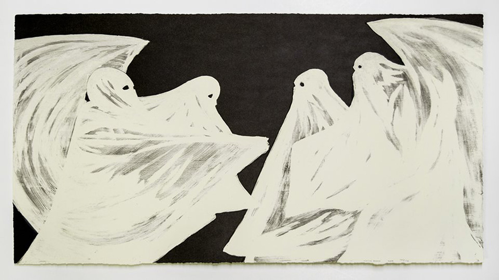 This is an image of four ghosts in white sheets.