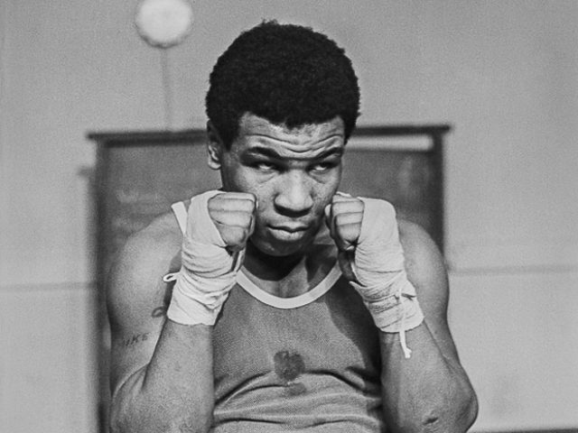 Lori Grinker, Mike Tyson, 14, does sits up at Cus D’Amato’s Boxing Gym in Catskill, NY