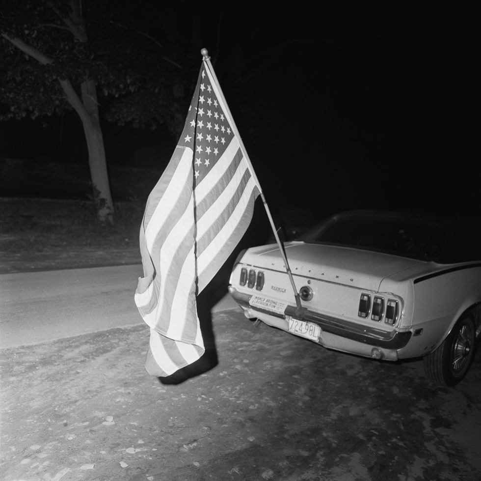 A black and white photograph taken by Henry Horenstein in 1972 at the Thomson Speedway in Thomson, Connecticut in 1972.