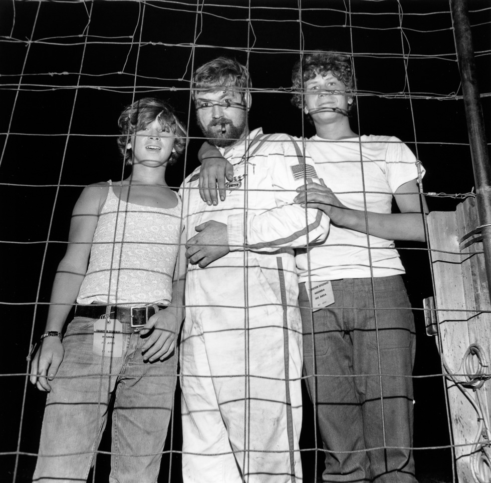 A black and white photograph taken by Henry Horenstein in 1972 at the Thomson Speedway in Thomson, Connecticut in 1972.