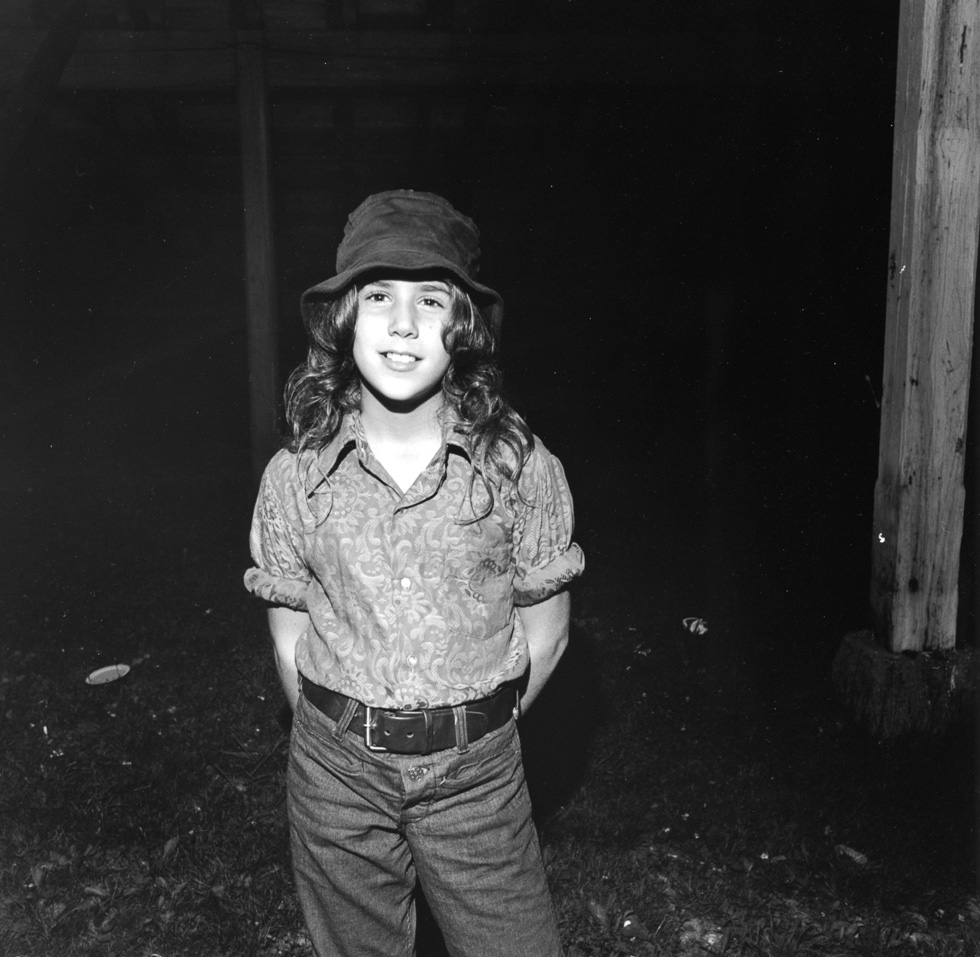 A black and white photograph taken by Henry Horenstein in 1972 at the Thomson Speedway in Thomson, Connecticut in 1972.