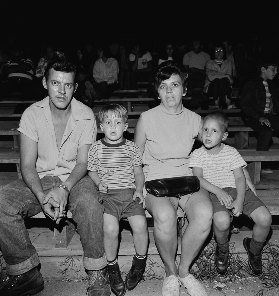 A black and white photograph taken by Henry Horenstein in 1972 at the Thomson Speedway in Thomson, Connecticut in 1972.