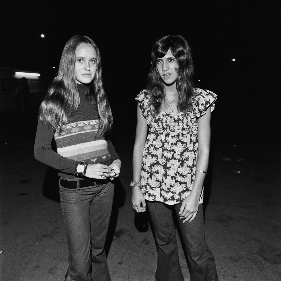 A black and white photograph taken by Henry Horenstein in 1972 at the Thomson Speedway in Thomson, Connecticut in 1972.