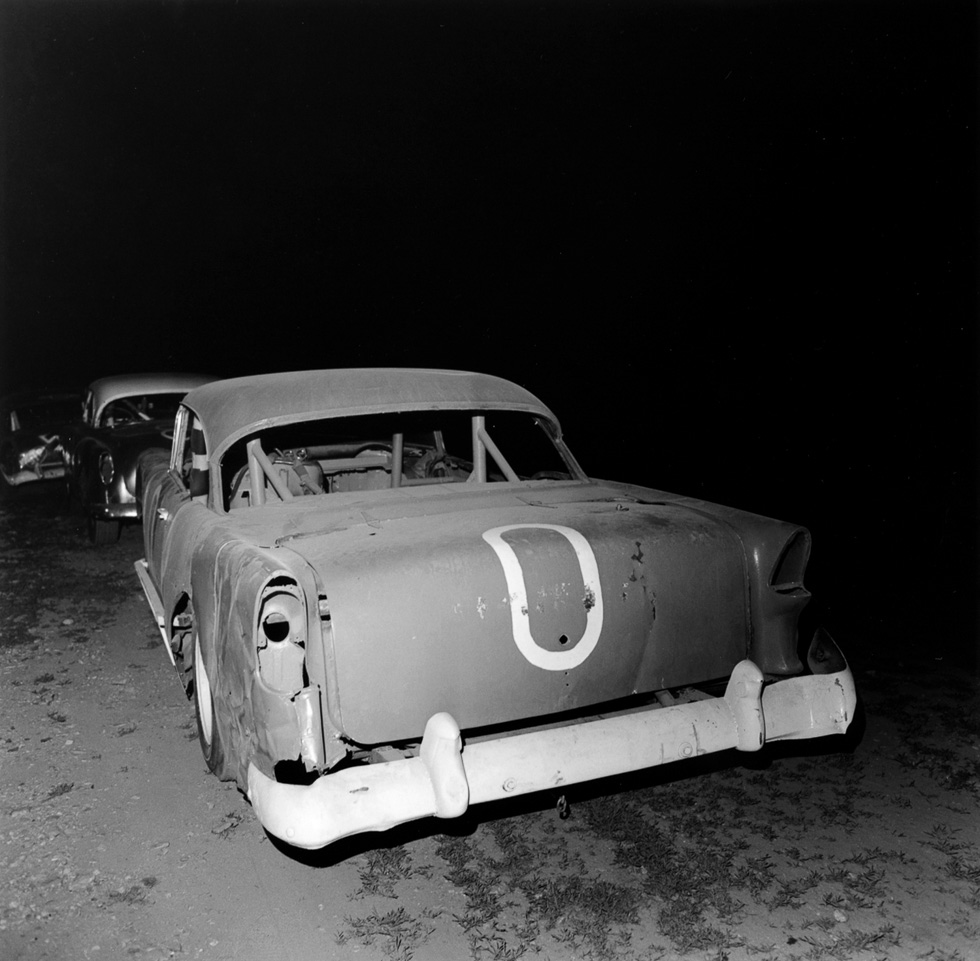 A black and white photograph taken by Henry Horenstein in 1972 at the Thomson Speedway in Thomson, Connecticut in 1972.