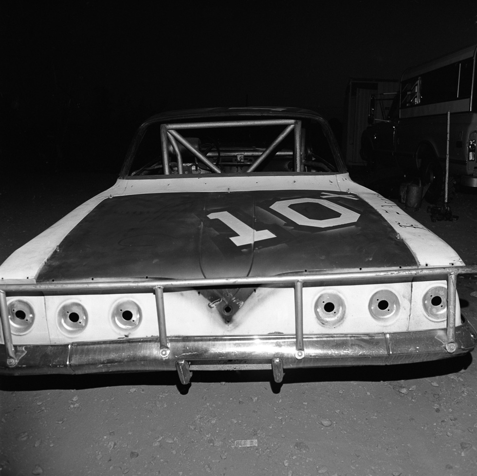 A black and white photograph taken by Henry Horenstein in 1972 at the Thomson Speedway in Thomson, Connecticut in 1972.