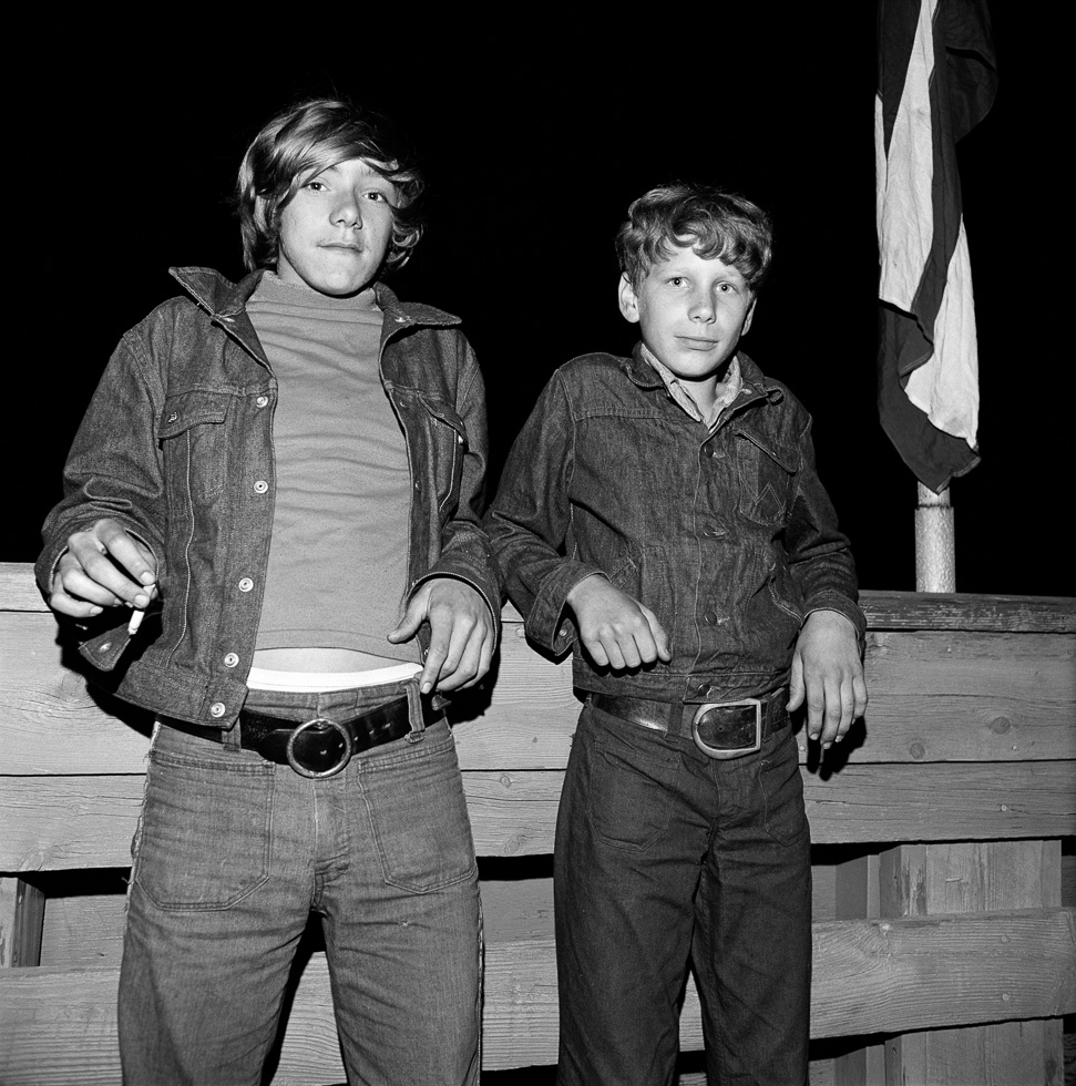 A black and white photograph taken by Henry Horenstein in 1972 at the Thomson Speedway in Thomson, Connecticut in 1972.