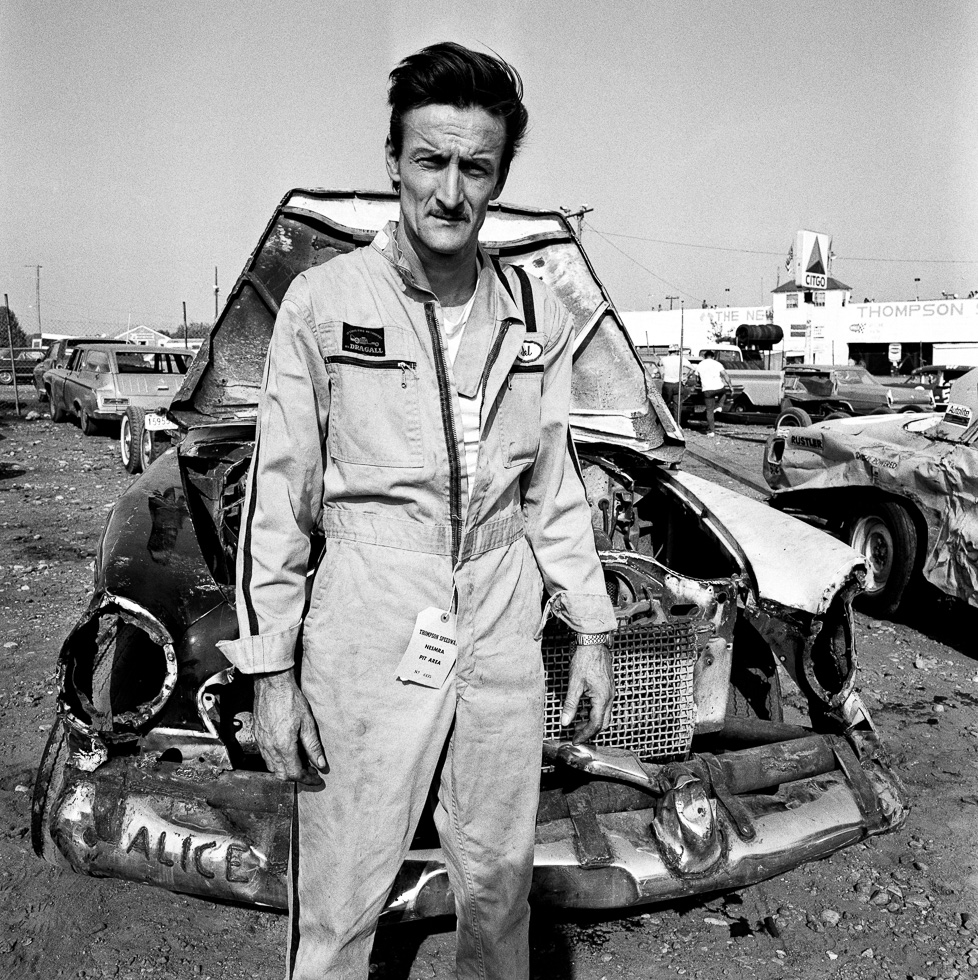 A black and white photograph taken by Henry Horenstein in 1972 at the Thomson Speedway in Thomson, Connecticut in 1972.