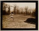 This is a sepia tone photograph by Curtice Taylor of Alan Running Naked in Rye, NY 1974.