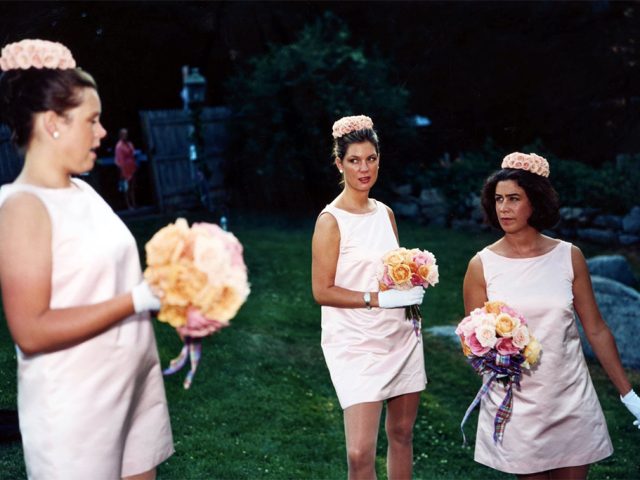 This is a photograph by Tina Barney of Three Bridesmaids in pink dresses.