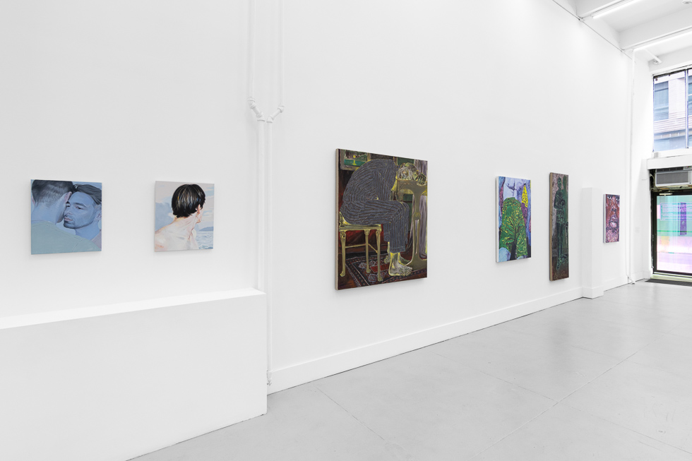 This is a photograph of a white-walled art gallery with colorful contemporary figurative paintings.