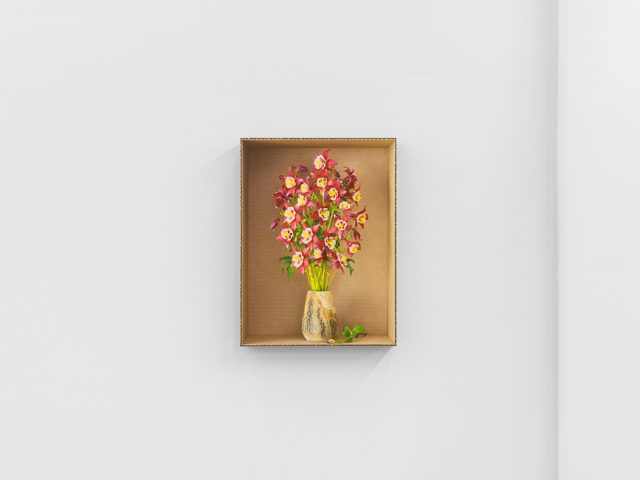 This is a photograph of Daniel Handal's exhibition "Engaños" on view at CLAMP.