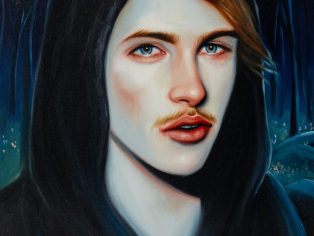 This is an oil painting of a pale boy in a black hoodie with copper hair, rosy cheeks, nose, lips, and eyes, and a light mustache.