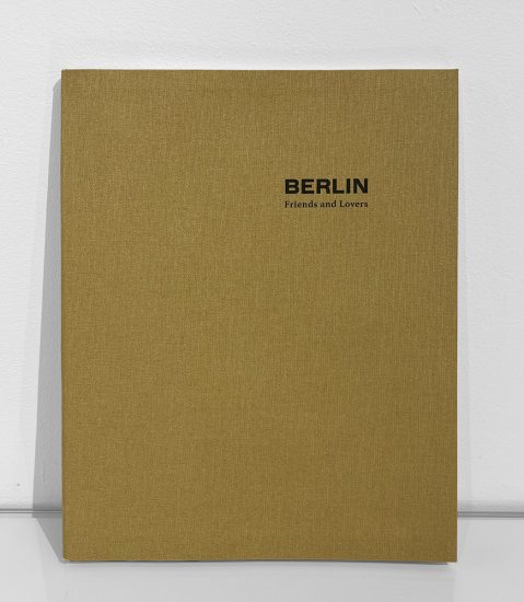 This is a photograph of a beige linen-bound book.