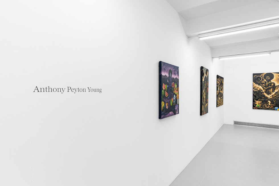 This is a photograph of paintings by Anthony Peyton Young on view at CLAMP in New York City.