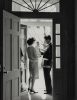 JFK with Jackie and Caroline in the Doorway of his Georgetown Home