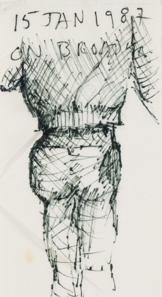 This is a drawing of a male figure in ink on a napkin.
