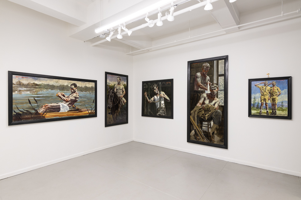 This is a photograph of oil paintings in a gallery setting.
