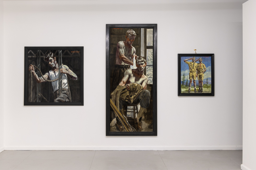 This is a photograph of oil paintings in a gallery setting.